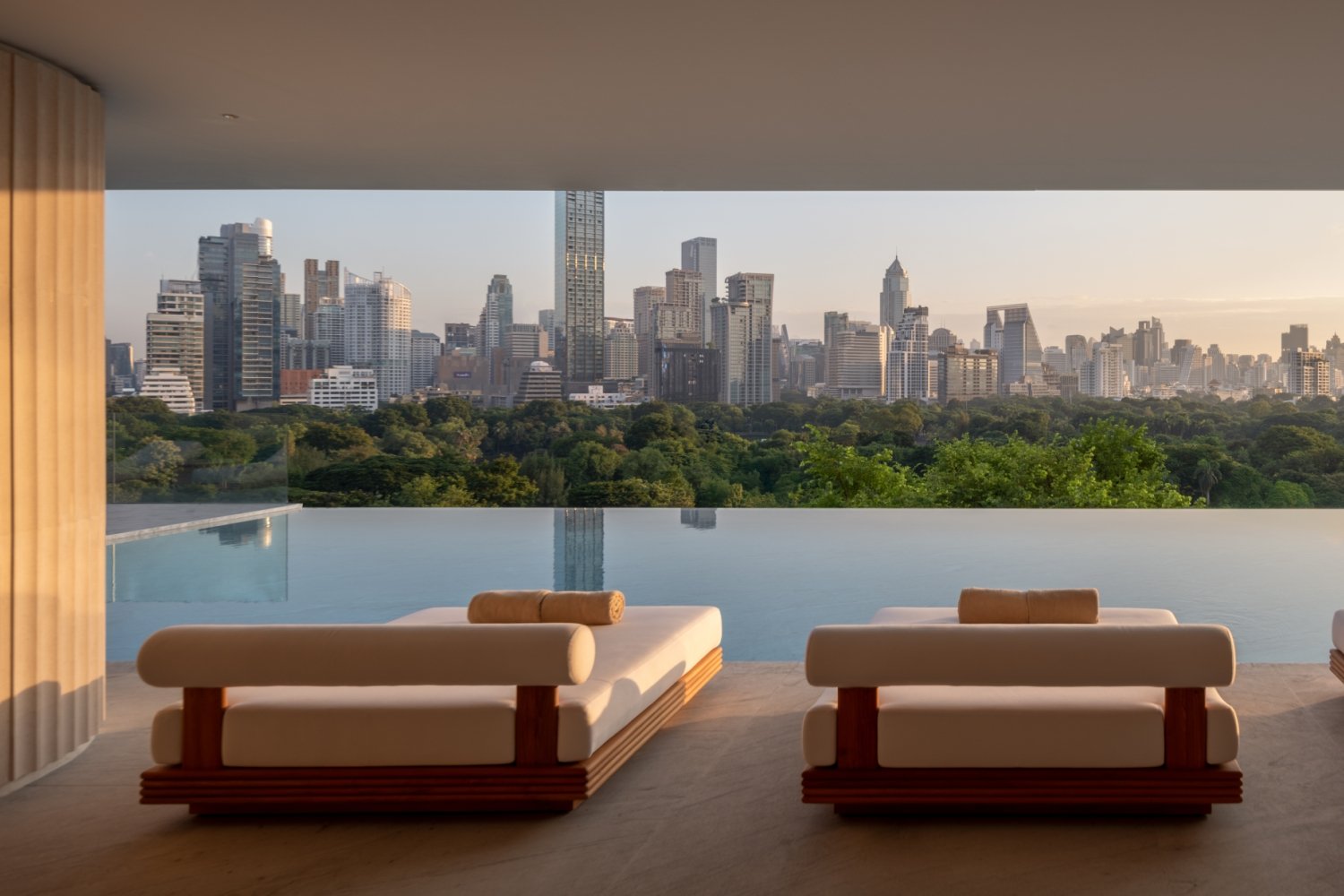 Top dusit-thani-bangkok-facility-pool-park-view-day-ti